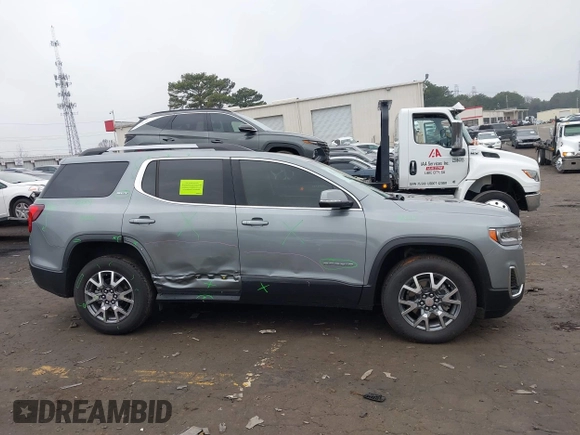 2023 GMC Acadia SLT with VIN 1GKKNML48PZ156202, listed as a IAAI auction lot 41526629 with 29,460 mi miles and . Bid and sale history available at DreamBid. Image 13.