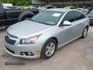 2014 Chevrolet Cruze 1LT with VIN 1G1PC5SB1E7229344, listed as a IAAI auction lot 42196094 with 97,226 mi miles and . Bid and sale history available at DreamBid. Image 2.