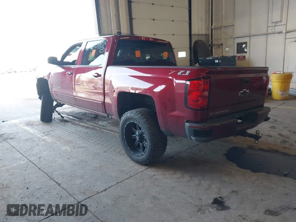 2018 Chevrolet Silverado 1500 LT with VIN 3GCUKREC0JG580317, listed as a IAAI auction lot 41868522 with 75,738 mi miles. Bid and sale history available at carsss.com. Image 3.