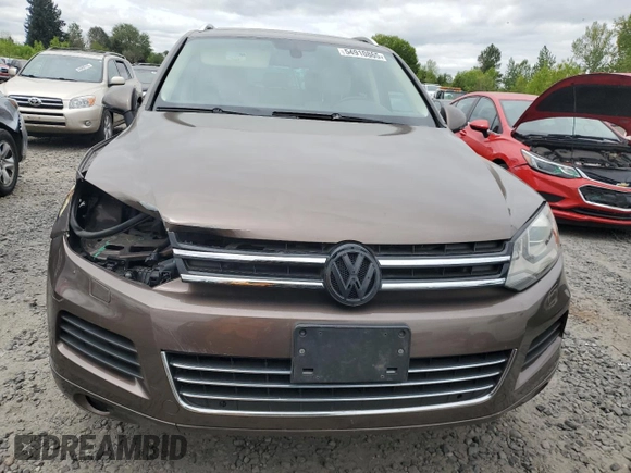 2012 Volkswagen Touareg Lux с VIN WVGEK9BPXCD012003, выставлен на аукционе Copart как лот 54910865 с пробегом 106 465 миль миль и Списание • Salvage title. История ставок и продаж доступна на DreamBid. Изображение 5.