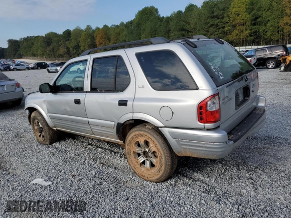 2001 Isuzu Rodeo S with VIN 4S2CK58W114317183, listed as a Copart auction lot 76280974 with 318,201 mi miles and Non Repairable. Bid and sale history available at DreamBid. Image 2.