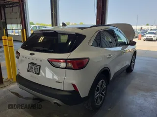 2021 Ford Escape SEL Hybrid with VIN 1FMCU9CZ1MUB25597, listed as a IAAI auction lot 42663573 with 79,061 mi miles and . Bid and sale history available at DreamBid. Image 18.