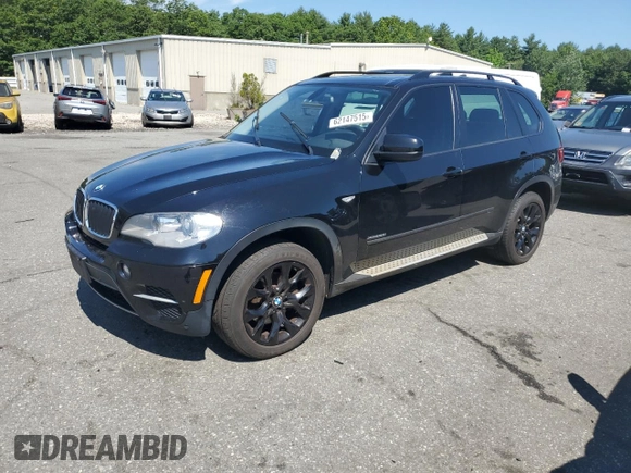 2012 BMW X5 35i with VIN 5UXZV4C54CL752079, listed as a Copart auction lot 62147515 with 147,244 mi miles and Clean title. Bid and sale history available at DreamBid. Image 1.
