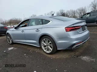2023 Audi A5 Sportback Premium z VIN WAUABCF52PA027060, wystawiony jako Copart lot #42776085 z przebiegiem 18 968 mil mil oraz Szkoda całkowita • Salvage title. Historia ofert i sprzedaży dostępna na DreamBid. Obrazek 2.