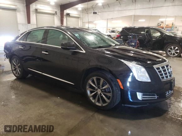 2014 Cadillac XTS Luxury with VIN 2G61N5S33E9246454, listed as a Copart auction lot 63100655 with 110,544 mi miles and Salvage title. Bid and sale history available at DreamBid. Image 4.