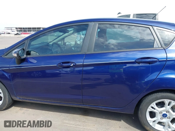 2016 Ford Fiesta SE with VIN 3FADP4EJ4GM199945, listed as a IAAI auction lot 41881260 with 98,945 mi miles. Bid and sale history available at carsss.com. Image 14.