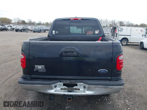 2002 Ford F-150 XLT with VIN 1FTRW08L32KD90202, listed as a IAAI auction lot 41850546 with 256,807 mi miles. Bid and sale history available at carsss.com. Image 19.