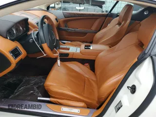 2009 Aston Martin DB9 z VIN SCFAD01E59GA10938, wystawiony jako Copart lot #39463124 z przebiegiem 19 856 mil mil oraz . Historia ofert i sprzedaży dostępna na DreamBid. Obrazek 7.