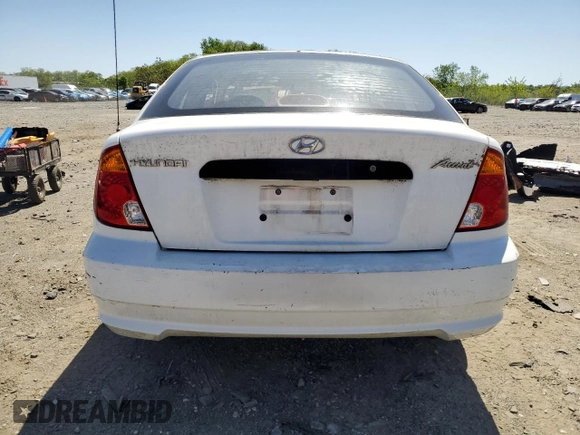 2003 Hyundai Accent с VIN KMHCF35C53U240220, выставлен на аукционе Copart как лот 52581415 с пробегом 102 322 миль миль и Списание • Salvage title. История ставок и продаж доступна на DreamBid. Изображение 6.