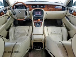 2006 Jaguar XJ Vanden Plas with VIN SAJWA82B16SH06996, listed as a Copart auction lot 62509025 with 80,236 mi miles and Salvage title. Bid and sale history available at DreamBid. Image 8.