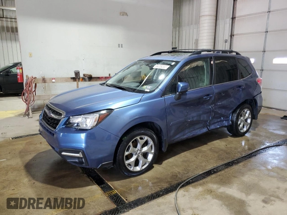 2017 Subaru Forester Touring z VIN JF2SJAWC9HH564242, wystawiony jako Copart lot #59209265 z przebiegiem Nie podano mil oraz Szkoda całkowita • Salvage title. Historia ofert i sprzedaży dostępna na DreamBid. Obrazek 1.