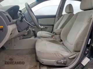 2005 Kia Spectra LX with VIN KNAFE121255179334, listed as a Copart auction lot 53144295 with 147,989 mi miles and Clean Title. Bid and sale history available at carsss.com. Image 7.