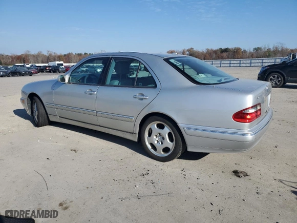 2000 Mercedes-Benz E-Class AWD with VIN WDBJF83J6YX032328, listed as a Copart auction lot 81353974 with 156,729 mi miles and Clean Title. Bid and sale history available at carsss.com. Image 2.