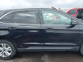 2020 Ford Edge SEL z VIN 2FMPK4J9XLBA78278, wystawiony jako IAAI lot #42181490 z przebiegiem 236 730 mil mil oraz . Historia ofert i sprzedaży dostępna na DreamBid. Obrazek 13.