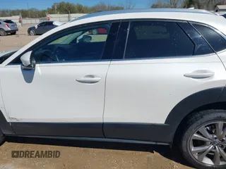 2022 Mazda CX-30 S Premium with VIN 3MVDMBDL1NM413540, listed as a IAAI auction lot 41681191 with 57,764 mi miles and . Bid and sale history available at carsss.com. Image 15.
