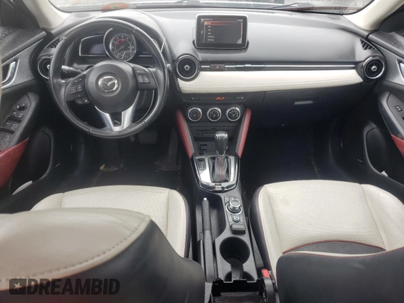 2016 Mazda CX-3 Grand Touring z VIN JM1DKBD77G0105451, wystawiony jako Copart lot #58341495 z przebiegiem 109 525 mil mil oraz Szkody całkowita. Historia ofert i sprzedaży dostępna na DreamBid. Obrazek 8.