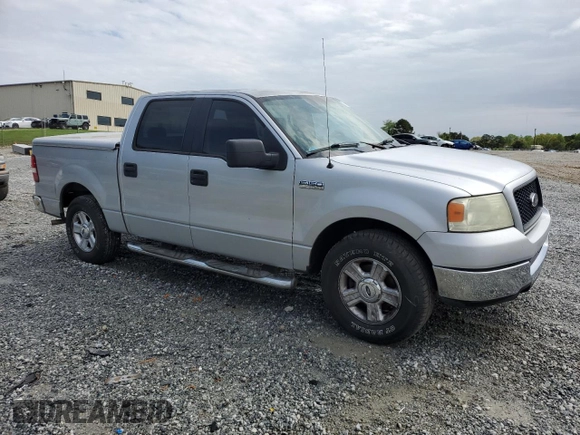 2005 Ford F-150 XLT with VIN 1FTRW12WX5FA79128, listed as a Copart auction lot 51963585 with 169,045 mi miles and Salvage Title. Bid and sale history available at carsss.com. Image 4.
