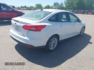 2015 Ford Focus SE z VIN 1FADP3F28FL334359, wystawiony jako IAAI lot #42520827 z przebiegiem 182 755 mil mil oraz . Historia ofert i sprzedaży dostępna na DreamBid. Obrazek 4.