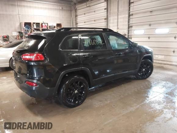 2014 Jeep Cherokee Latitude with VIN 1C4PJMCS0EW291135, listed as a IAAI auction lot 41860372 with 171,524 mi miles and . Bid and sale history available at DreamBid. Image 4.