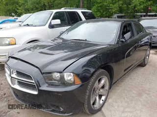 2011 Dodge Charger SE with VIN 2B3CL3CG3BH512706, listed as a IAAI auction lot 42122199 with 181,258 mi miles and . Bid and sale history available at carsss.com. Image 2.