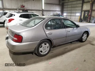 2000 Nissan Altima XE with VIN 1N4DL01D7YC125104, listed as a Copart auction lot 69108214 with 150,213 mi miles and Salvage Title. Bid and sale history available at carsss.com. Image 3.