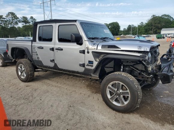 2020 Jeep Gladiator Sport S with VIN 1C6HJTAG9LL127546, listed as a Copart auction lot 54955945 with 99,511 mi miles and Salvage title. Bid and sale history available at DreamBid. Image 4.