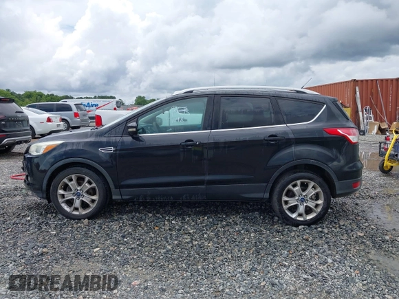 2015 Ford Escape Titanium с VIN 1FMCU0JXXFUB10676, выставлен на аукционе IAAI как лот 42412073 с пробегом 129 737 миль миль и . История ставок и продаж доступна на DreamBid. Изображение 14.