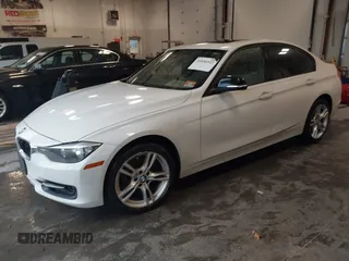 2014 BMW 3 Series 328i xDrive with VIN WBA3B5C53EP543964, listed as a IAAI auction lot 41856923 with 149,440 mi miles. Bid and sale history available at carsss.com. Image 2.