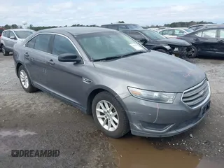 2014 Ford Taurus SE z VIN 1FAHP2D88EG143275, wystawiony jako IAAI lot #41801787 z przebiegiem 150 988 mil mil oraz . Historia ofert i sprzedaży dostępna na DreamBid. Obrazek 1.