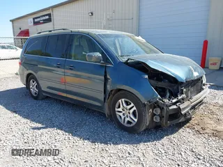 2006 Honda Odyssey EX-L with VIN 5FNRL38666B460590, listed as a IAAI auction lot 41998373 with 266,486 mi miles and . Bid and sale history available at carsss.com. Image 1.