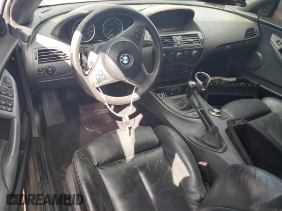 2004 BMW 6 Series 645Ci z VIN WBAEK73424B260088, wystawiony jako Copart lot #76481124 z przebiegiem 105 410 mil mil oraz Nie do naprawy • Non repairable. Historia ofert i sprzedaży dostępna na DreamBid. Obrazek 8.