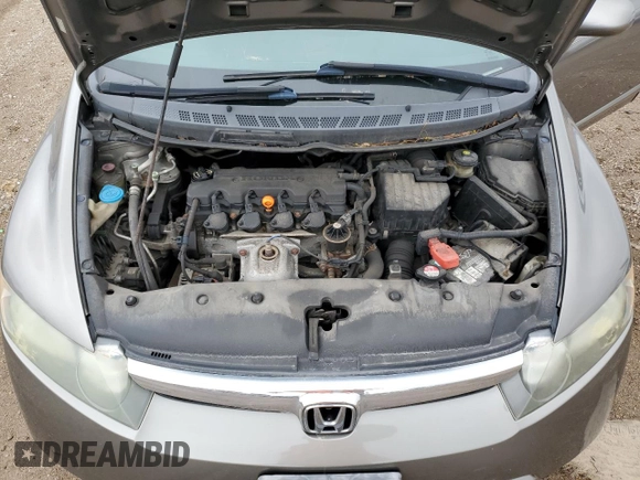 2006 Honda Civic LX z VIN 1HGFA16586L132710, wystawiony jako Copart lot #55261865 z przebiegiem 143 679 mil mil oraz Szkoda całkowita • Salvage title. Historia ofert i sprzedaży dostępna na DreamBid. Obrazek 11.