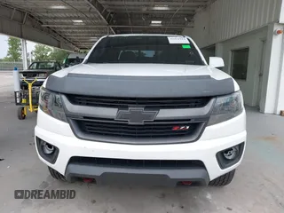 2020 Chevrolet Colorado 2WD Z71 with VIN 1GCGSDEN2L1159458, listed as a IAAI auction lot 42412924 with 90,011 mi miles and . Bid and sale history available at DreamBid. Image 13.