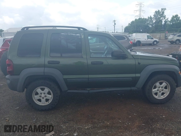 2006 Jeep Liberty Sport with VIN 1J4GL48K76W288408, listed as a IAAI auction lot 39990700 with 215,716 mi miles. Bid and sale history available at carsss.com. Image 13.