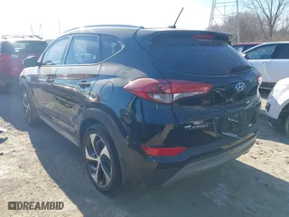 2017 Hyundai Tucson Value with VIN KM8J33A24HU343231, listed as a IAAI auction lot 41395327 with 133,017 mi miles. Bid and sale history available at carsss.com. Image 3.