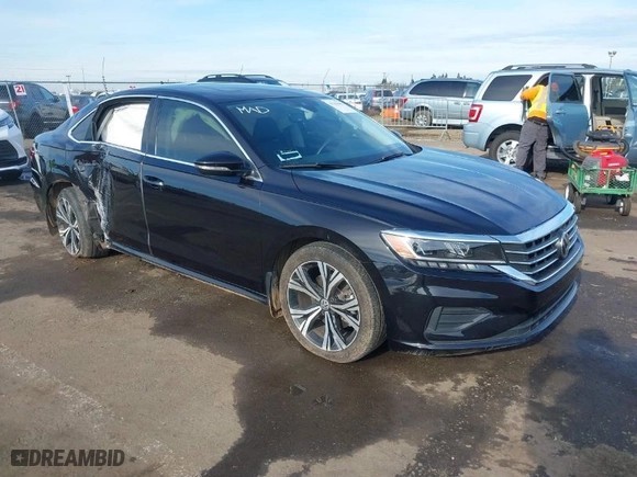 2021 Volkswagen Passat 2.0T SE with VIN 1VWSA7A39MC015718, listed as a IAAI auction lot 41233666 with 28,142 mi miles. Bid and sale history available at carsss.com. Image 1.