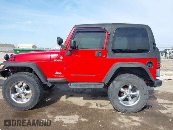 2004 Jeep Wrangler Sport with VIN 1J4FA49S54P744171, listed as a IAAI auction lot 41974657 with 173,230 mi miles. Bid and sale history available at carsss.com. Image 14.
