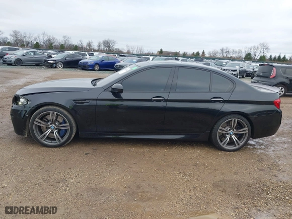 2013 BMW M5 with VIN WBSFV9C51DD095750, listed as a IAAI auction lot 40907304 with 93,014 mi miles. Bid and sale history available at carsss.com. Image 14.