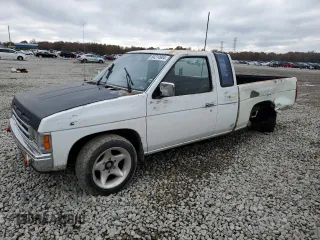 1990 Nissan Frontier with VIN 1N6SD16S9LC404281, listed as a Copart auction lot 84214904 with 279,270 mi miles and Salvage title. Bid and sale history available at DreamBid. Image 1.