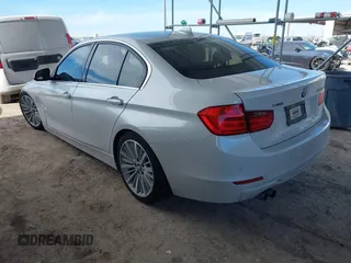 2013 BMW 3 Series 328i xDrive with VIN WBA3B3G53DNR79514, listed as a IAAI auction lot 41662949 with 104,125 mi miles. Bid and sale history available at carsss.com. Image 3.
