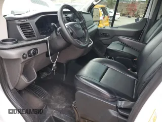 2020 Ford Transit Cargo with VIN 1FTYE1Y81LKA70748, listed as a Copart auction lot 80916514 with 104,077 mi miles and Salvage Title. Bid and sale history available at DreamBid. Image 7.