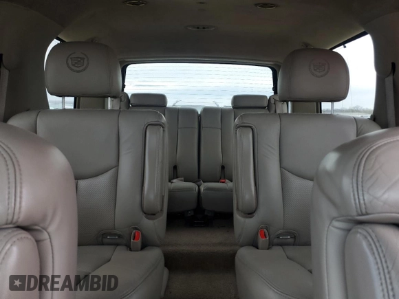 2003 Cadillac Escalade z VIN 1GYEK63N73R277166, wystawiony jako Copart lot #51797955 z przebiegiem 374 735 mil mil oraz Czysty tytuł • Clean title. Historia ofert i sprzedaży dostępna na DreamBid. Obrazek 10.