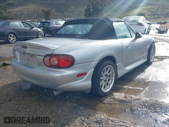 2002 Mazda MX-5 Miata Cloth with VIN JM1NB353X20223041, listed as a IAAI auction lot 41740060 with 177,934 mi miles and . Bid and sale history available at DreamBid. Image 4.
