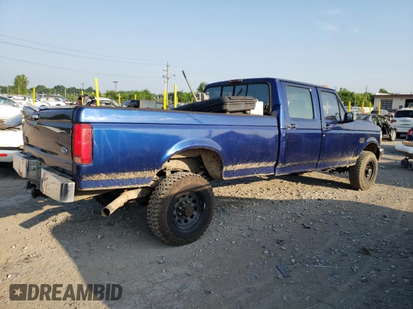 1997 Ford F-350 with VIN 1FTJW36F0VEC59307, listed as a Copart auction lot 62430515 with 199,894 mi miles and Salvage title. Bid and sale history available at DreamBid. Image 3.