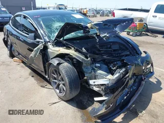 2018 Tesla Model 3 Long Range Battery z VIN 5YJ3E1EA2JF095525, wystawiony jako IAAI lot #42148713 z przebiegiem Nie podano mil oraz . Historia ofert i sprzedaży dostępna na DreamBid. Obrazek 6.
