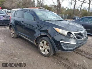 2012 Kia Sportage LX with VIN KNDPB3A23C7203826, listed as a IAAI auction lot 41464022 with 260,980 mi miles. Bid and sale history available at carsss.com. Image 1.