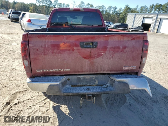 2005 GMC Canyon SLE Z71 with VIN 1GTDT196758102670, listed as a Copart auction lot 83826734 with 91,979 mi miles and Salvage Title. Bid and sale history available at carsss.com. Image 6.