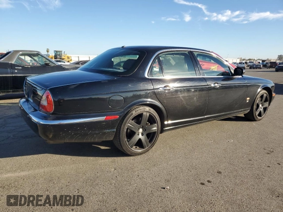 2006 Jaguar XJ with VIN SAJWA73C26TH03133, listed as a Copart auction lot 81796674 with 128,006 mi miles and Non repairable. Bid and sale history available at DreamBid. Image 3.