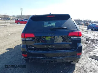 2019 Jeep Grand Cherokee Laredo E with VIN 1C4RJFAG6KC661777, listed as a IAAI auction lot 41762646 with 103,547 mi miles. Bid and sale history available at carsss.com. Image 16.