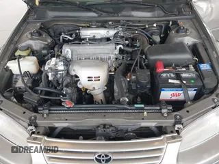 1998 Toyota Camry LE z VIN JT2BG22KXW0157647, wystawiony jako IAAI lot #42282818 z przebiegiem 267 681 mil mil oraz . Historia ofert i sprzedaży dostępna na DreamBid. Obrazek 10.
